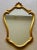 Vintage Hollywood Regency wall mirror and matching console shelf featuring elegant Rococo Revival styling with scrolling...