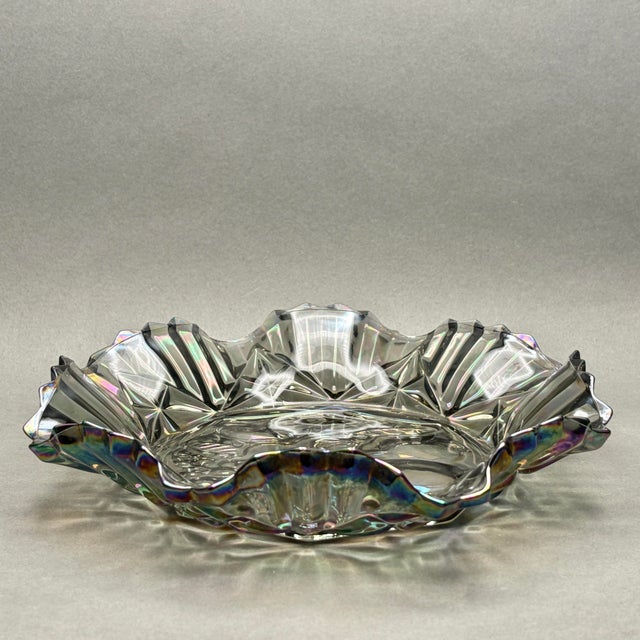 This striking vintage carnival glass bowl by Federal Glass features the classic Pioneer pattern with an embossed intaglio...