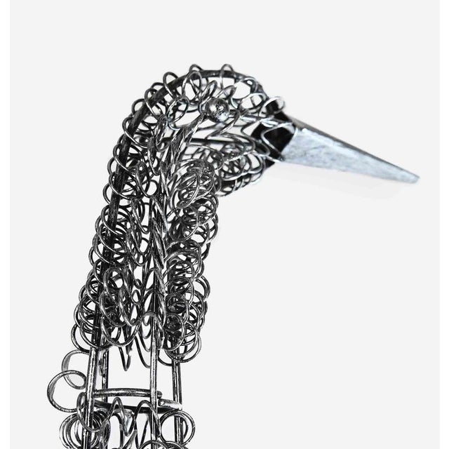 Heron is an orginal contemporary sculpture realized by the artist Bob Paulson in 2020. Hand-beaten metal sculpture...
