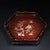 This is a striking, hexagonal wooden tray featuring intricate mother-of-pearl (nacre) inlay work. Crafted from a dark,...