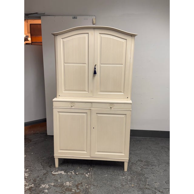 Design Plus Gallery presents a Herrgården Cabinet by Carl Malmsten for Bodafors. This original mid-century Swedish cabinet...