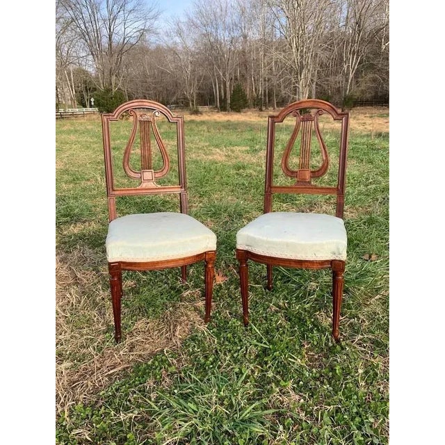 Pair of Louis XVI Style Walnut Lyre Splat Side Chairs. 19th Century. Well made, refinished frame Approximate measurements:...