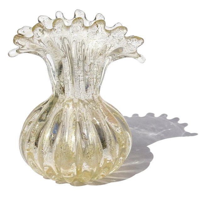 Beautiful vintage Murano hand blown clear, bubbles and gold flecks Italian art glass flower vase. The vase has a fan with...