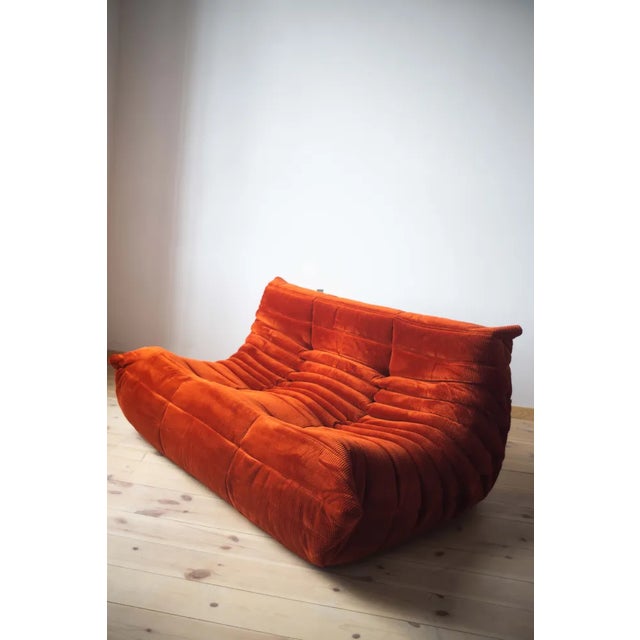 This Togo has been reupholstered with new foam and high-quality new fabric, keeping its inner structure giving the item...