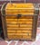 Handsome midcentury split bamboo Campaign style small trunk with copper handles and accent strips with embossed bamboo...