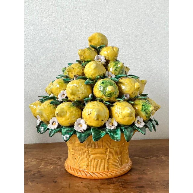 This exquisite vintage Italian majolica topiary is a masterful celebration of Mediterranean charm, bringing the vibrant,...