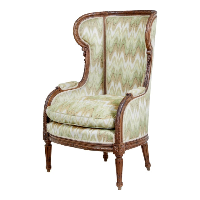 French Louis XVI Style 1870s Walnut Bergère à Oreilles with Carved Décor For Sale