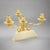 An Aldo Tura Modernist three arm candelabra. Patinated brass arms with wooden base covered in laquered parchment. The...