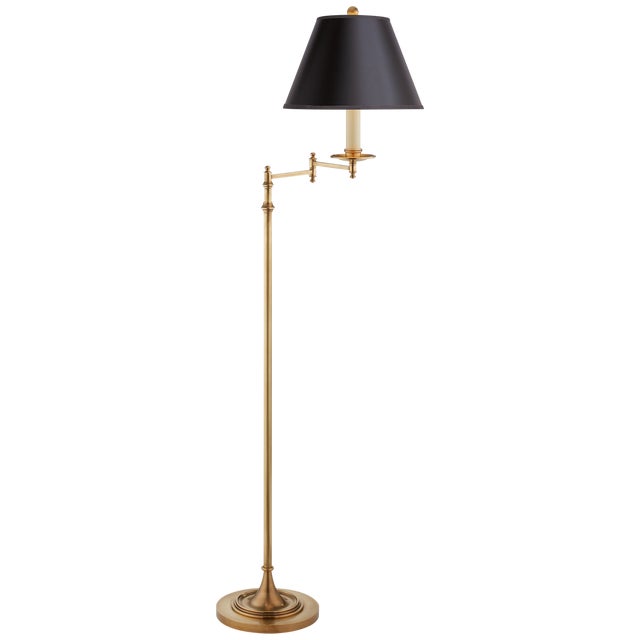 Dorchester Swing Arm Floor Lamp in Antique-Burnished Brass with Black Shade Designer: Chapman & Myers Height: 51" - 64"...