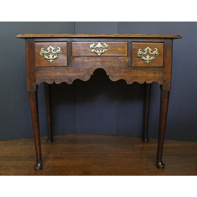 18th century Country English Queen Anne Lowboy or Dressing Table. Oak - warm, original, nicely maintained finish. Raised...