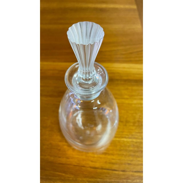 Lalique signed crystal 10 inches high wine decanter with frosted stopper, barsac pattern.