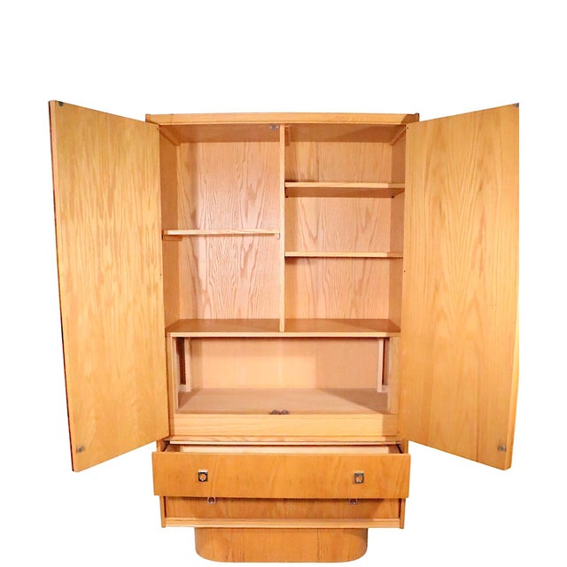 Stylish Brutalist, Organic Mid Century Modern, made in Canada by The Tobago Furniture Company, circa 1970's. The cabinet...