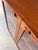 This display cabinet is a truly exceptional design by H.W. Klein for the premium Danish manufacturer Bramin and a prime...