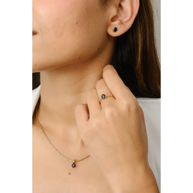 This is part of Chairish’s Fine Jewelry assortment. Blue Sapphire Ring, Pendant and Earrings Jewelry Set Made in 18K Gold...