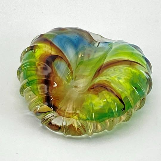 Small gem of a paperweight in a classic mid-century stylized cowrie shell design. Designed with an organic, wavy ribbed...