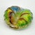 Small gem of a paperweight in a classic mid-century stylized cowrie shell design. Designed with an organic, wavy ribbed...