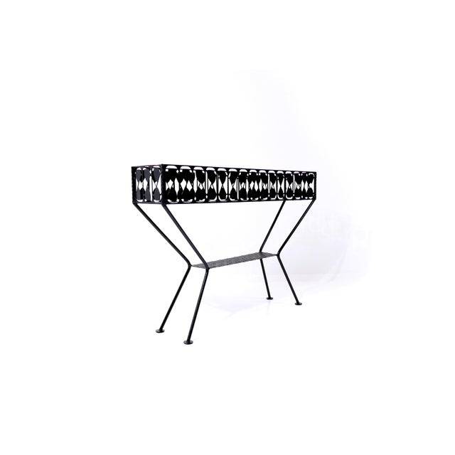 This decorative plant stand comes from France and is an unknown production from the 1950s. Its style is reminiscent of a...