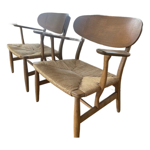 Vintage Pair of Carl Hansen & Son Ch 22 Lounge Chairs by Hans Wegner For Sale