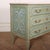 Pretty late 19th century Italian painted three drawer pine commode with a faux marble top. 1890. This piece is designed in...