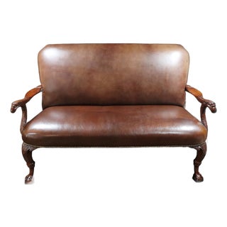 Early 20th Century Hand Carved Antique Loveseat With Leather Upholstery For Sale