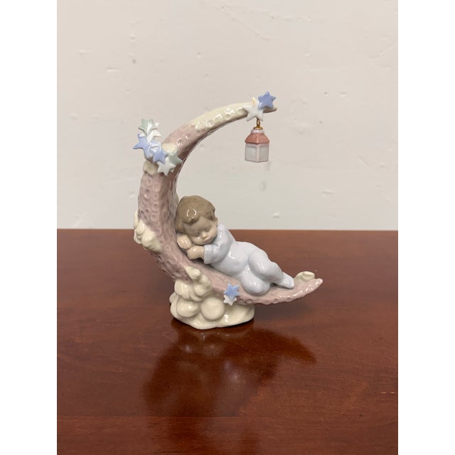 Design Plus Gallery presents the Heavenly Slumber Boy Figurine by Lladró. Designed by sculptor Antonio Ramos and...