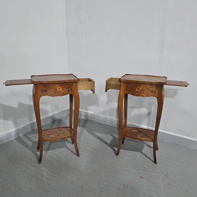 A very good quality pair of French Tulipwood and marquetry inlaid lamp tables, each with a slide and single drawer, ormolu...