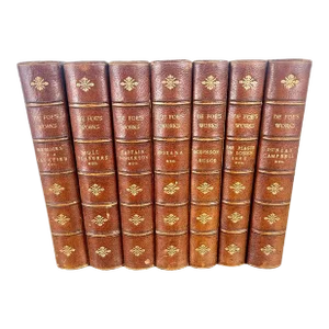 Set of Seven Leather Volumes of Daniel De Foe's Works