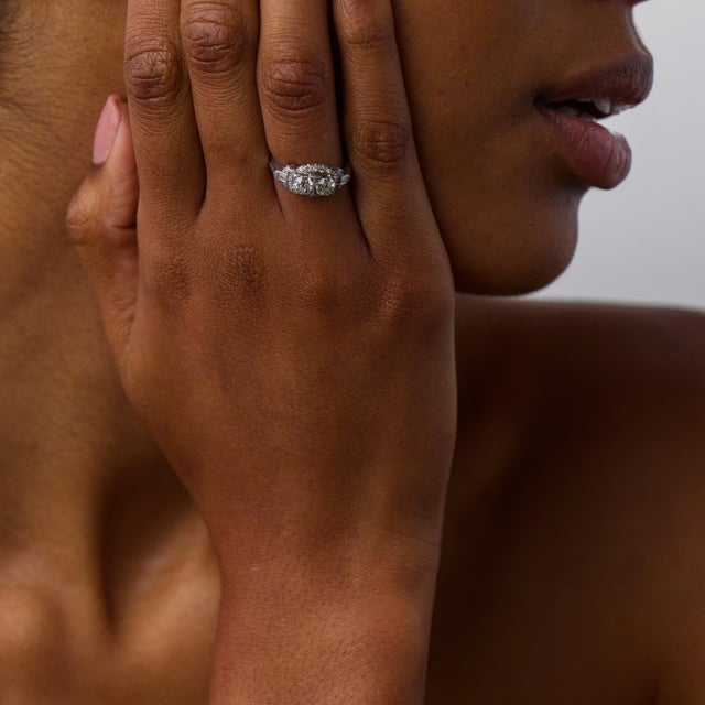 This elegant Mid Century diamond ring is a beautifully balanced jewel from the 1950’s, featuring 2 old European cut...