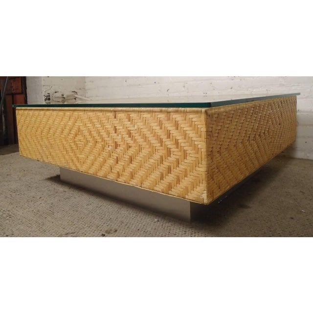 Beautiful diamond wove coffee table with glass top. Great for indoor and outdoor use. (Please confirm item location - NY...