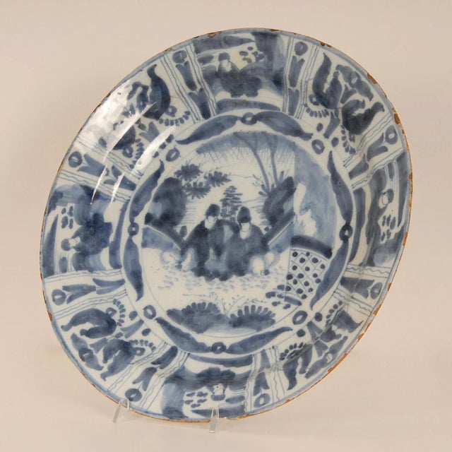 Large 17th Century Delft dish Chinoiserie blue and white Delftware Charger Material: Delft, earthenware, pottery. Design:...