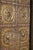 Antique Indian Painted Teakwood and Brass Door on Iron Stand, of exceptional quality and beauty, with a yellow/gold paint...