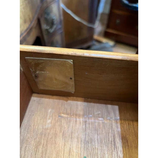 The Baker Furniture Historic Charleston Chippendale Mahogany Chest of Drawers is a stylish and antique piece made from...