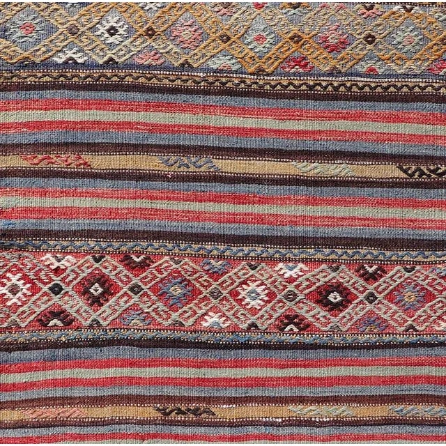 Red Mid 20th Century Vintage Turkish Kilim With Horizontal Stripes and Tribal Motifs in Bright Tones For Sale - Image 8 of 12