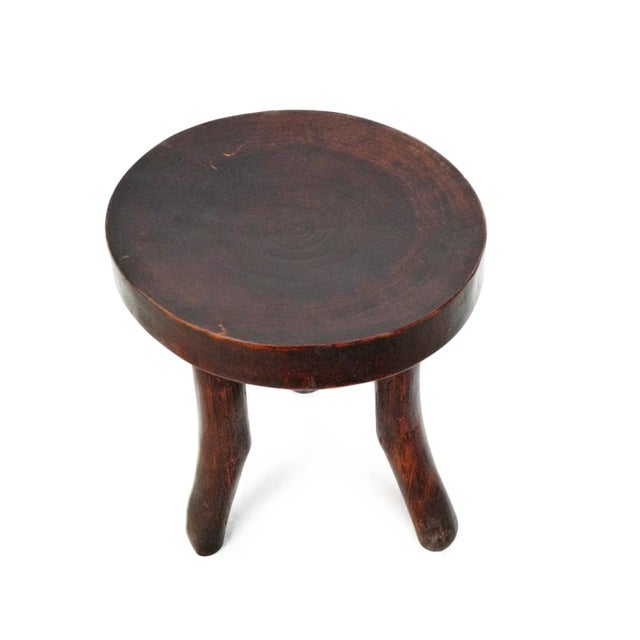 Vintage Luo stool from Sudan. Simple modern design with three bent legs and round stool top. Wonderful as a decorative...