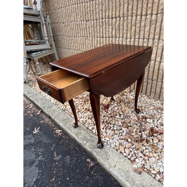 Statton Furniture Queen Anne Style Solid Cherry Pembroke Drop-Leaf. Side Table Solid wood frame, brass hardware, dovetail...