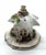 A charming miniature Staffordshire porcelain cottage, richly detailed with a flower-covered garden, painted foliage, and...