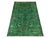 This Sultani rug features a Persian-inspired floral design across a vivid turquoise field. Flowers, leaves, and winding...