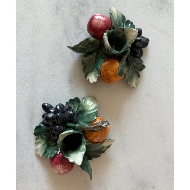 Pair of vintage hand painted Capodimonte porcelain ceramic candle holders in the shape of fruit. Made in Italy by Visconti...