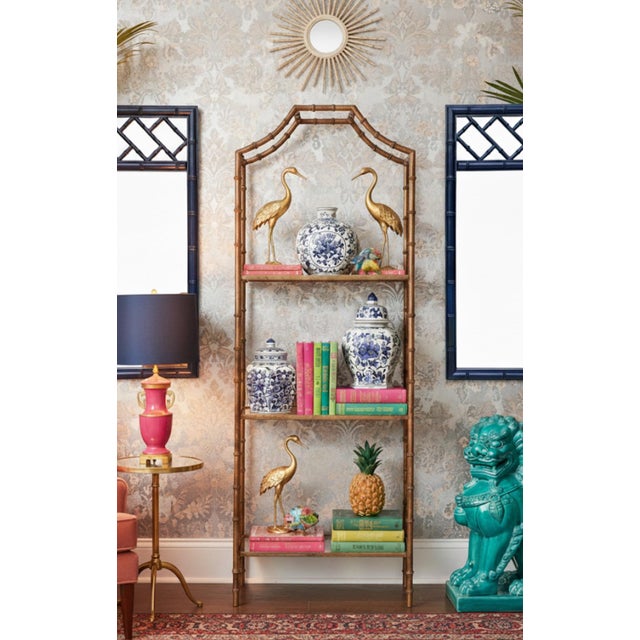 Imagine the light catching the rich, custom gilt finish of this magnificent piece, casting a warm, confident glow across...