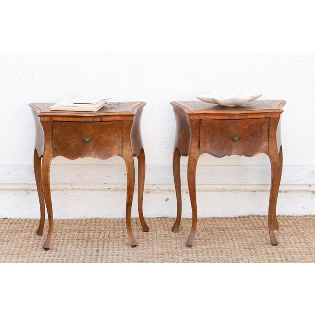 This exquisite pair of Italian bedside tables represents the height of mid-century continental elegance. Crafted from rich...