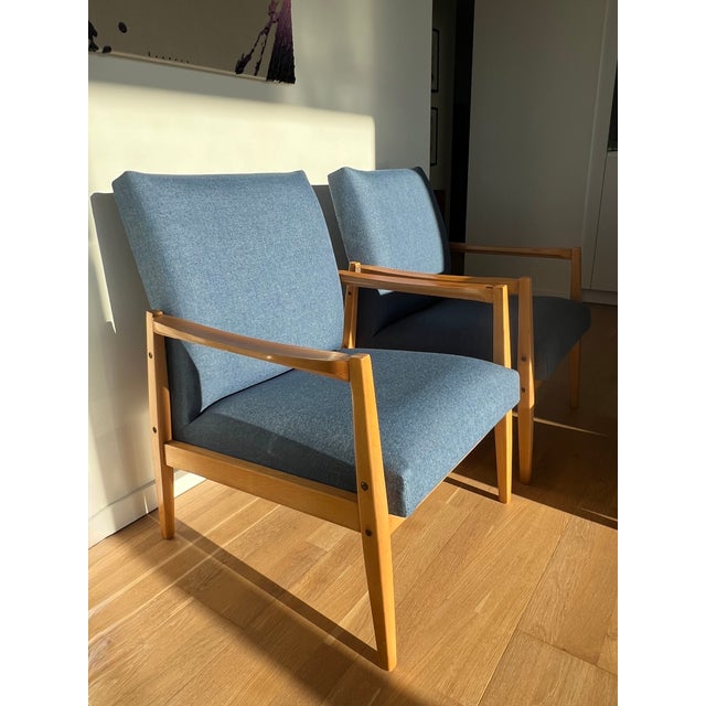 This Jitona armchair from former Czechoslovakia made in 1971 has been completely reupholstered with new foam and fabric in...