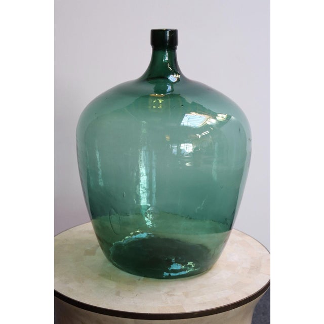 French Demijohn / Carboy originally used for transporting wine (early 20th Century, France). Composed of 'blown-to-mold'...