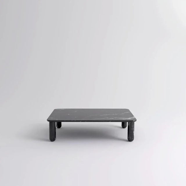 Medium black marble "sunday" coffee table, jean-baptiste souletie dimensions: 100 w x 150 d x 35 h cm materials: black...