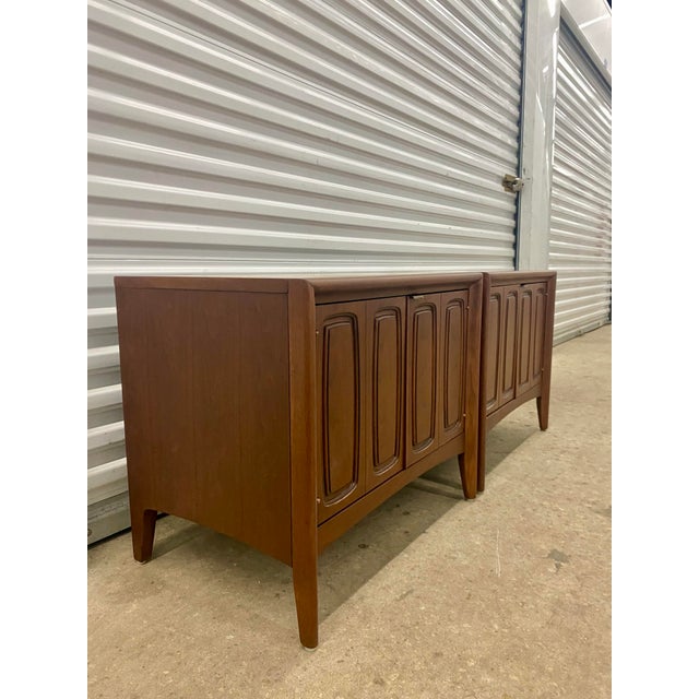 "Emphasis" style Nightstand, a notable example of American Mid-Century Modern furniture from the 1960s. characterized by...