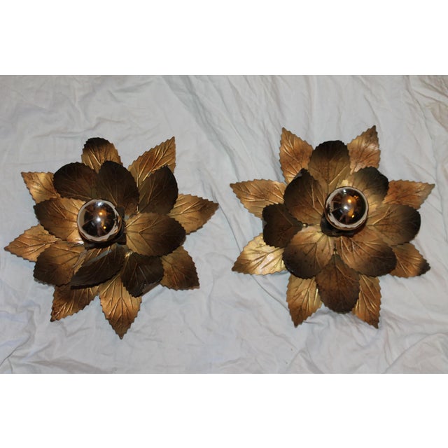 A pair Modernist mid century weighty gilt dore metal floral form sconces/ wall lights/ spectacular.