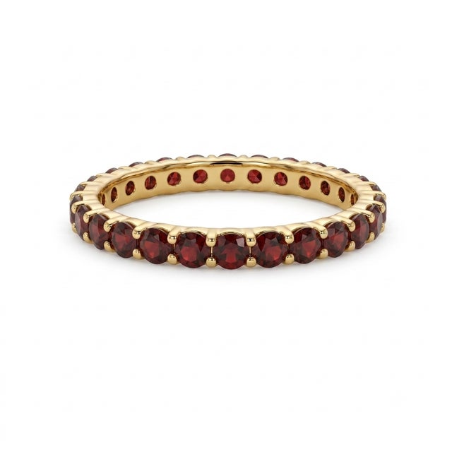 Ignite your jewelry collection with the rich, passionate allure of this stunning full-eternity band. Masterfully crafted...