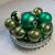 Lot of 20 vintage glass Christmas ornaments in varying sizes and shades of green. Many marked Shiny Brite or Made In USA...
