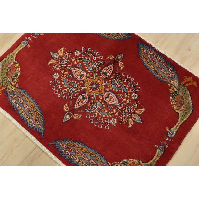 An authentic vintage traditional Kashan rug hand-knotted with fine wool and natural dyes. This rug features a central...