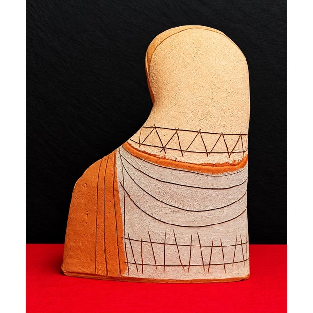 A decorative terracotta sculpture created by the Italian artist Clizia, pseudonym of Mario Giani, active in the field of...