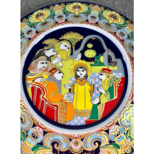 Vibrant hand-painted porcelain Christmas plate entitled Christ Child Visits Temple.